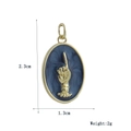 Detail view of oval gold-plated pendant with blue marble inlay and hand relief, 2.3cm height - Blue Marble Hand Gesture (7)