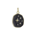 Close-up of a vintage gold-plated star pendant with black enamel and polar star detail - Black Starburst Enamel (12)