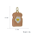 Detail showing dimensions of vintage toast-shaped pendant with heart egg pattern - Toast Fried Egg Heart (16)