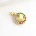 Macro shot of 18k gold plated heart pendant with colorful crystals and polished center - Round Heart (04)