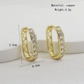 Detail of gold-plated U-shaped hoop earring with white zircons and hollow grid texture - Gold U-shaped Grid Rhinestone Style (03)