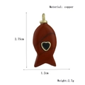 Vis hanger van koper en bruine steen met zwart hart en gouden oogje - Rode Steen met Strass