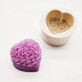 Macro shot of heart-shaped rose texture silicone mold and purple handmade soap finished piece - Rose Heart