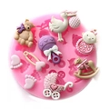 Pink round silicone mold featuring baby rocking horse, teddy bear, and tiny footprints - Round Stroller Feet Pattern (1#)