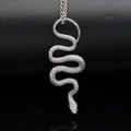 Silver snake pendant necklace with detailed scales and double strand chain on black mirror - Silver Snake Pendant (Without Chain)