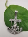 Close-up of silver anchor cross pendant with sparkling crystals on a green leaf - Small 37*46—Without Chain / Silver