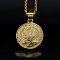 Detailed view of gold praying hands medallion with Latin text engraving and woven chain - Gold - No Chain