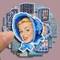 Vintage Klein Blue 50-piece scrapbook sticker set featuring butterflies and retro figures - Klein Blue