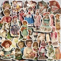 Close-up of vintage Victorian style figure stickers with white die-cut borders for journaling - Victoria Doll Style B