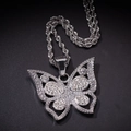 Pendentif papillon hip hop argenté avec cristaux blancs sur une chaîne torsadée - Couleur Acier (Pendentif Uniquement)