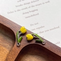 Detail of yellow enamel tulip flower charms for DIY jewelry making on wooden tray - Yellow Silver Ring