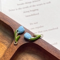 Macro shot of blue and green tulip enamel charms for DIY jewelry making accessories - Blue Gold Ring