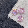 Macro shot of colorful aurora star-shaped glass beads for DIY jewelry making - Pink Purple Star