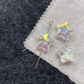 Macro detail of aurora star glass beads with iridescent coating for DIY jewelry - White Star