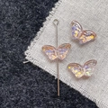 Macro shot of butterfly-shaped iridescent glass beads for DIY jewelry making and craft projects - Light Pink Butterfly