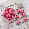 Close-up of pink round acrylic beads with red heart patterns for DIY jewelry making - Style 9 Pink Heart Printed 12mm