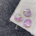 Detailed macro view of purple iridescent shell beads for DIY jewelry making and crafts - Purple Shell