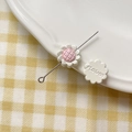 Detailed view of pink and white DIY flower beads with embossed FLOWER text on the bottom - Sunflower (22#)