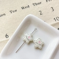 Détail de perles en étoile Smile avec cœur rose pour la création de bijoux DIY - Étoile Sourire Blanche