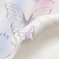 Dettaglio di un ciondolo a farfalla lavanda con stella d'argento per gioielli fai-da-te - Farfalla Viola Bordo Argento