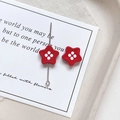 Macro view of a red star button bead with white dots and metal pin for DIY jewelry crafts - Star Shape - Red