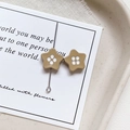 Detailed view of mocha-colored star-shaped beads on a stylish white decorative card - Star Shape - Khaki