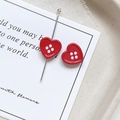 Close-up of red heart button charms with glossy enamel finish for DIY jewelry - Heart Shape - Red