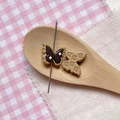 Macro detail of butterfly charms in a wooden spoon for DIY jewelry and crafts - Khaki Double Layer Butterfly