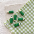 Detailed view of green pencil-shaped alloy beads for DIY jewelry and handmade crafts - Dark Green