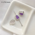Detalle macro de dijes de calabaza morada con circonitas y artesanía de plata calada - Calabaza Morada Bañada en Oro Blanco