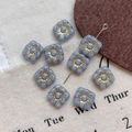 Close-up of square blue Czech glass beads with gold sunflower pattern for DIY jewelry - 22#