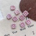 Close-up of pink Czech glass flower beads with pearlescent finish for DIY jewelry - 16#