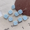 Detail view of light blue pearlescent square flower glass beads for DIY jewelry making - 4#