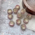 Detail of dusty pink gradient glass flower beads with gold centers for DIY jewelry - Matte Pink White With Gold Lines