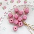 Pink cube beads with white spiral patterns for DIY jewelry making on white ceramic plate - 9# Pink Swirl Style