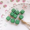 Close-up of green and white checkered square beads on a decorative white ceramic plate - 8# Dark Green Plaid Style