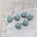 Detail of vintage blue cat head beads with gold engraving and functional through-hole - Yellow Blue