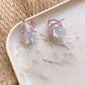 Detail of DIY jellyfish acrylic charm with gradient colors and translucent bead tassels - Pink and Green