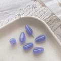 Close-up of purple teardrop Czech glass beads with blue stripes for DIY jewelry making - 8# Transparent Purple Blue Edging