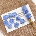 Macro detail of ice-blue hollow flower beads with marble texture for DIY jewelry - 6# Ice Clear Blue