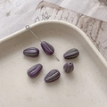 Macro detail of purple water drop glass beads with green vertical stripes for DIY jewelry - 4# Purple Green Edging