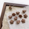 Macro detail of retro star-shaped ceramic beads with marble texture for DIY jewelry - 1# Mottled Coffee