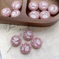 Detailed close-up of pink glass flower beads with embossed daisy texture for DIY jewelry - Peach Pink (14#)