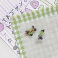 Detail of dachshund enamel charms with golden rings for DIY jewelry and accessories - Green With Brown Body