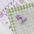 Detail of dachshund puppy charms with purple polka dot vests for DIY jewelry making - Purple