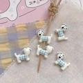 Close-up of five cute cartoon puppy charms with blue plaid pattern for DIY jewelry - Blue Plaid Puppy