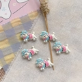 Close-up of five cute resin puppy figurines wearing hats for DIY jewelry and crafts - Blue and Pink Hat Puppy