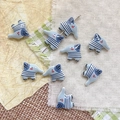 Detailed view of light blue ceramic elephant beads for DIY handmade jewelry crafting - Haze Blue Elephant