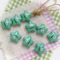 Star-shaped mint green beads with cartoon faces and holes for DIY jewelry making - Green-Star