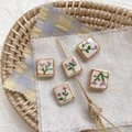 Close-up of handmade square ceramic beads with strawberry floral patterns for jewelry making - 1# Square - Coffee Edge Pink Flower
